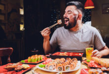 man eating food